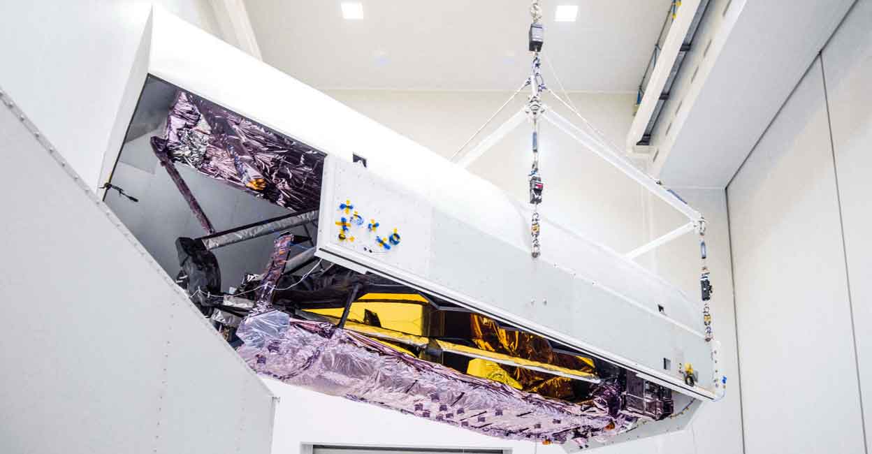 NASA Engineers unpack, clean and prepare the James Webb Space Telescope ahead of its scheduled launch into orbit, upon its arrival at the launch site in Kourou, French Guiana, as seen in this NASA image released on November 2, 2021. NASA/Chris Gunn/Handout via Reuters