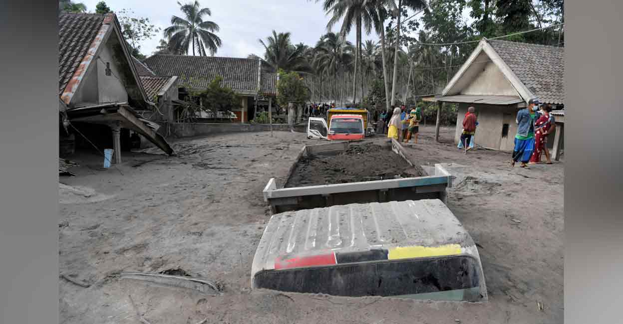 Semeru Volcano eruption Trucks covered by volcanic ash which is spewed out of Mount Semeru are seen in Sumber Wuluh Village, Lumajang, East Java province, Indonesia on Sunday. Photo: Reuters