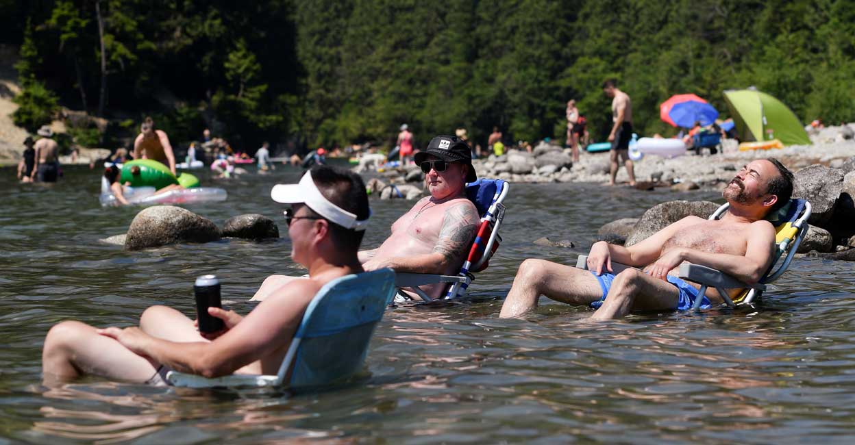 Record heat forces western Canada province to shut schools, universities