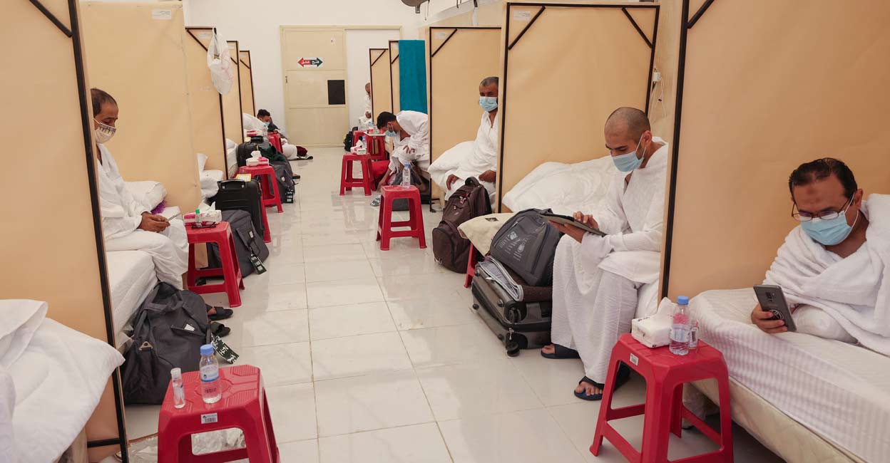 Muslim pilgrims Muslim pilgrims rest at their camp in Mina, which sits in a narrow valley surrounded by rocky mountains near the Saudi holy city of Mecca, and is transformed each year into a vast encampment for Hajj pilgrims, on July 18, 2021. Photo by Fayez Nureldine / AFP