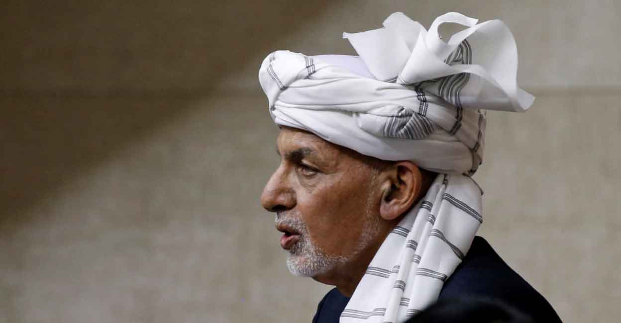 FILE PHOTO: Afghan President Ashraf Ghani speaks at the parliament in Kabul, Afghanistan August 2, 2021. REUTERS/Stringer