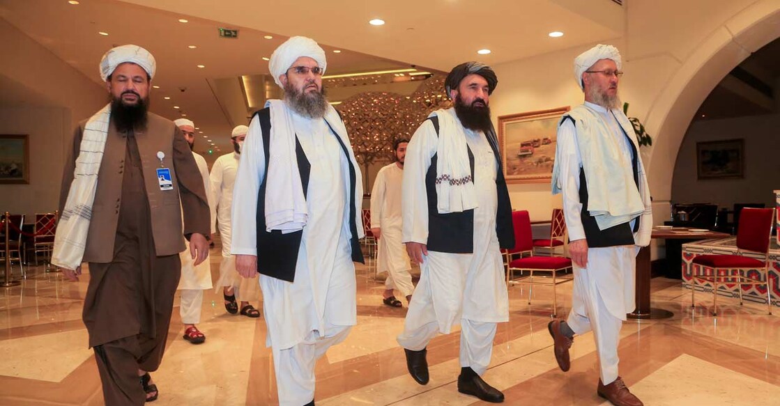 Abdul Salam Hanafi, member of the Taliban negotiating team and the Taliban delegation, arrive for Afghan peace talks in Doha, Qatar, August 12, 2021. Reuters/Hussein Sayed