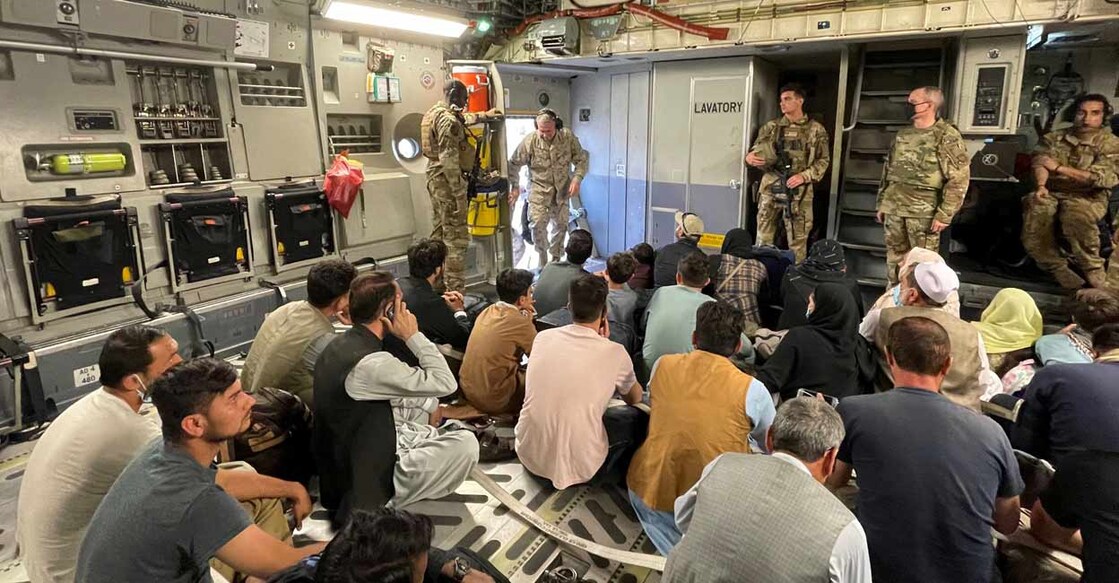 Taliban keep some evacuees from reaching Kabul airport, as US vows to finish airlift