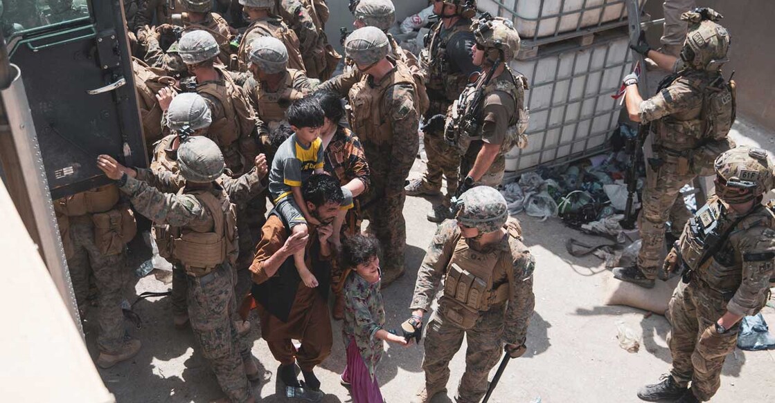 US Marines and Norwegian coalition forces assist with security at an Evacuation Control Checkpoint ensuring evacuees are processed safely during an evacuation at Hamid Karzai International Airport, Kabul, Afghanistan, August 20, 2021. Photo: US Marine Corps/Staff Sgt Victor Mancilla