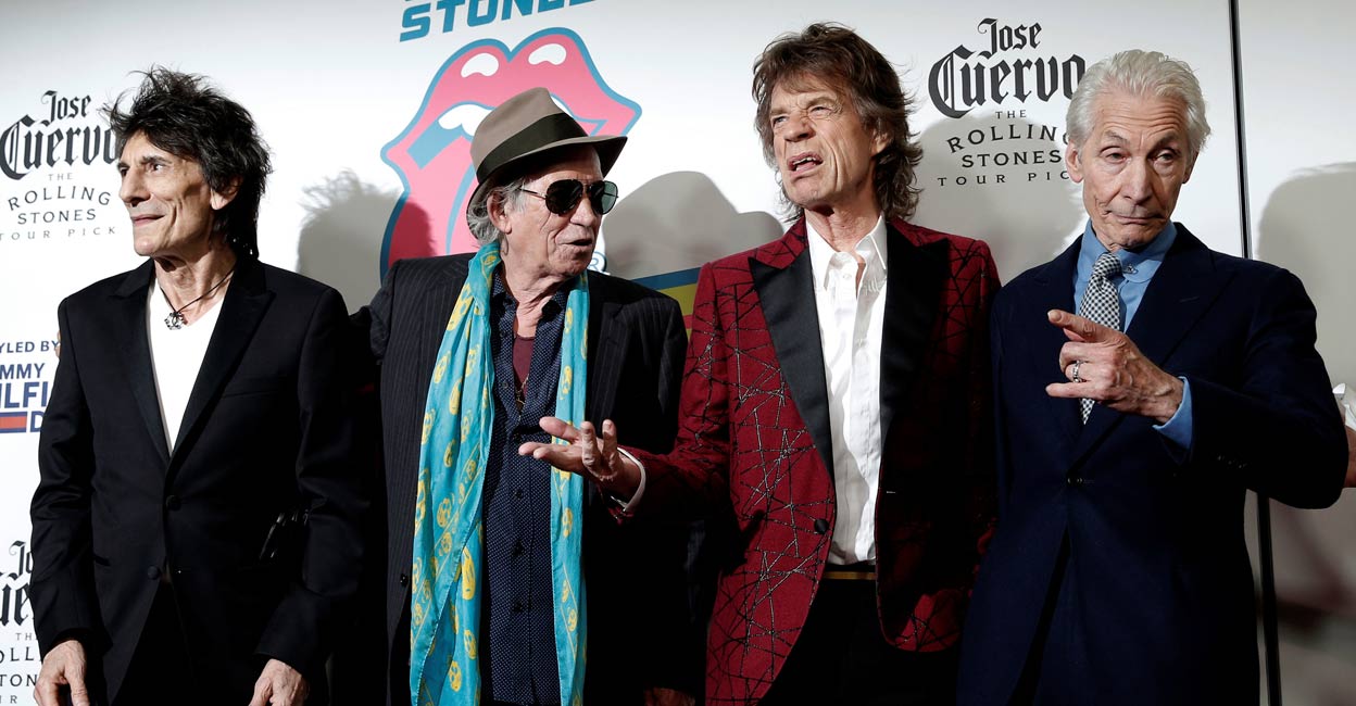 Rolling Stones drummer Charlie Watts dies after tour pull out The Rolling Stones (L-R) Ronnie Wood, Keith Richards, Mick Jagger and Charlie Watts pose as they arrive for the opening of the new exhibit "Exhibitionism: The Rolling Stones" in the Manhattan borough of New York City, US, November 15, 2016. File Photo: REUTERS/Mike Segar