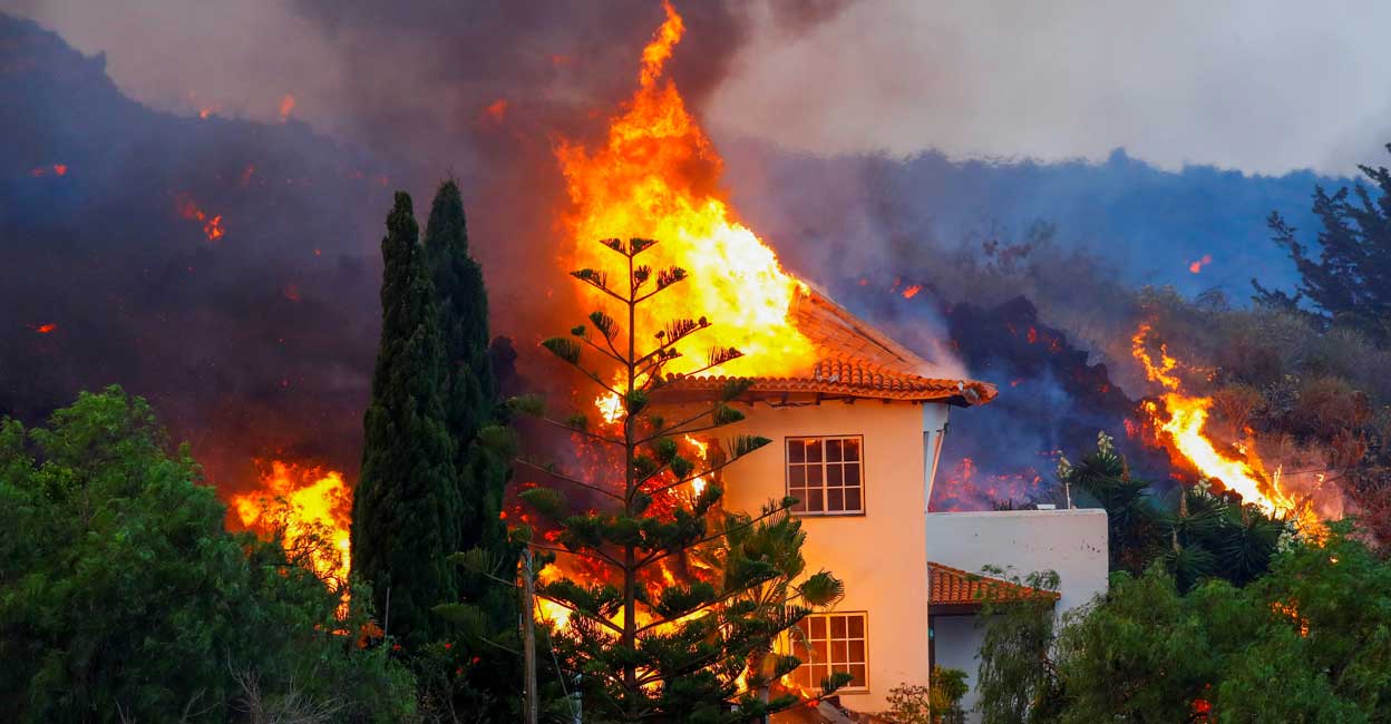 Thousands flee as lava spewing from volcano on Spain's La Palma island destroys houses
