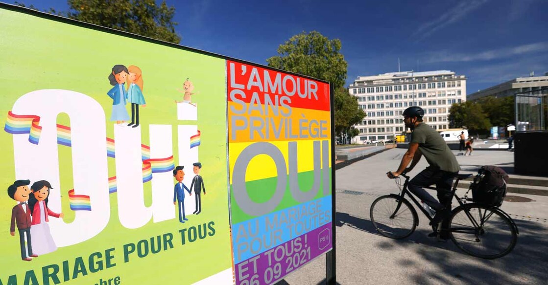  Posters are pictured before a vote on same sex marriage in Geneva, Switzerland, September 23, 2021. Poster reads : "Love without privilege, yes to marriage for all". REUTERS/Denis Balibouse