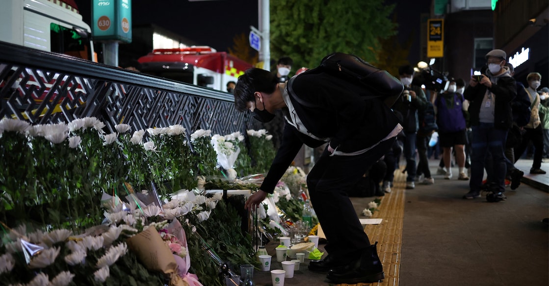 A man pays tribute near the scene of the stampede during Halloween festivities, in Seoul. Photo: REUTERS