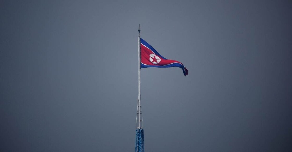 A North Korean flag flutters at the propaganda village of Gijungdong in North Korea, in this picture taken near the truce village of Panmunjom inside the demilitarized zone (DMZ) separating the two Koreas, South Korea, July 19, 2022. File Photo: Reuters/Kim Hong-Ji