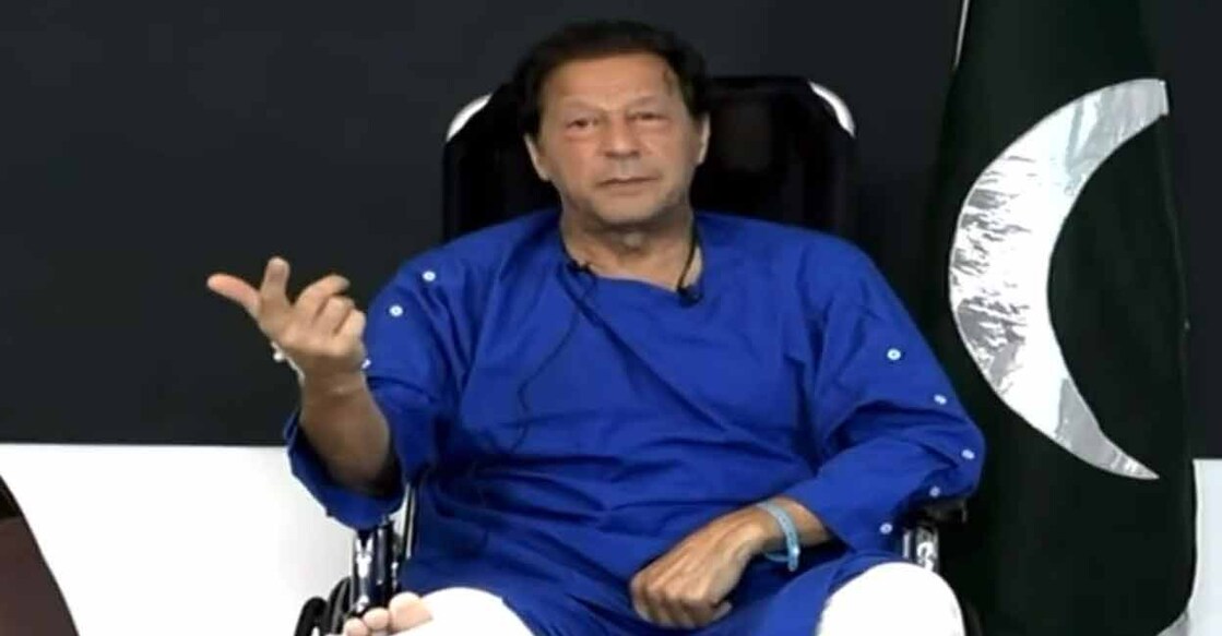 Imran Khan delivers an address from a hospital in Lahore on Friday. Screengrab: Twitter/@PTIofficial