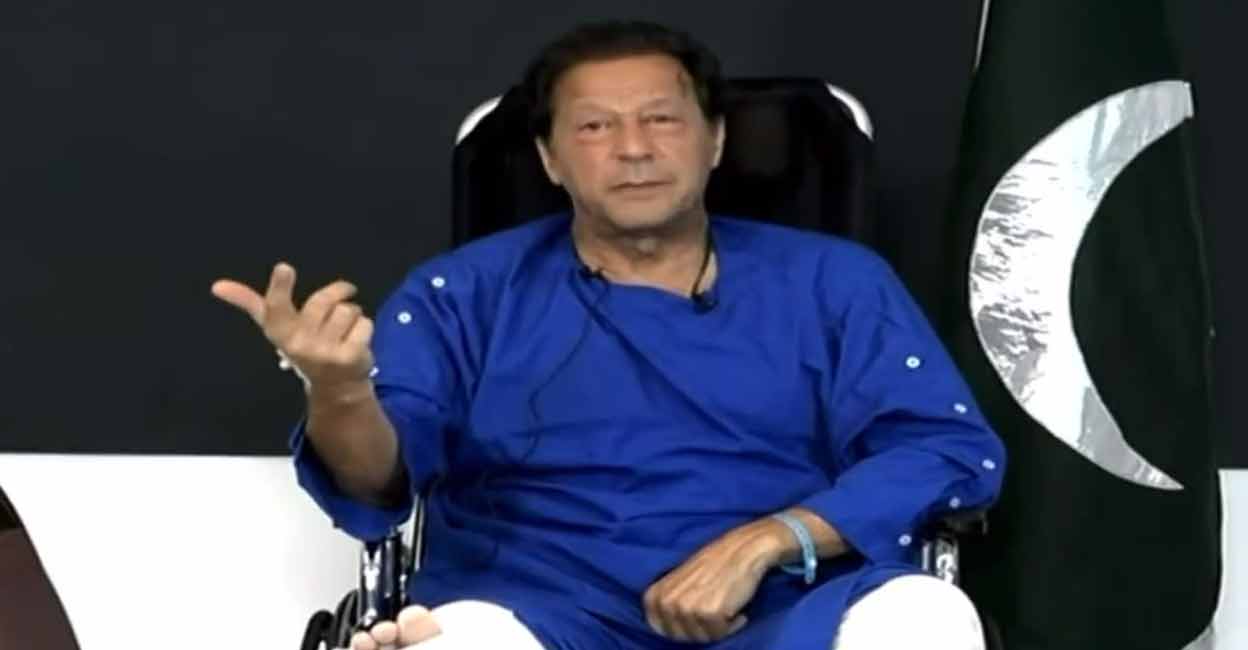Imran Khan delivers an address from a hospital in Lahore on Friday. Screengrab: Twitter/@PTIofficial