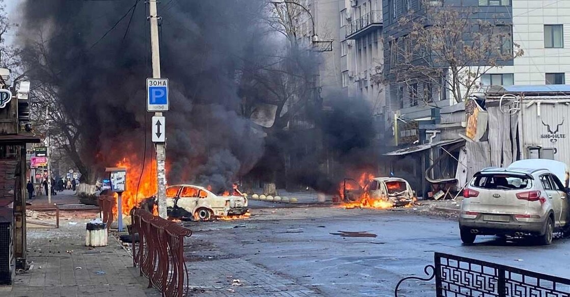 Cars burn on a street after a Russian military strike, amid Russia's attack of Ukraine, in Kherson, Ukraine December 24, 2022. Ukrainian Presidential Press Service/Handout via REUTERS