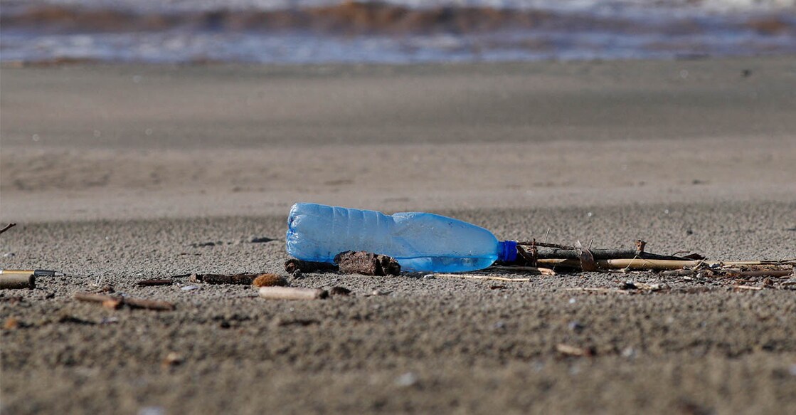 un-main A plastic bottle lies on the sand at Maccarese beach, west of Rome, Italy | Photo:. REUTERS/Max Rossi