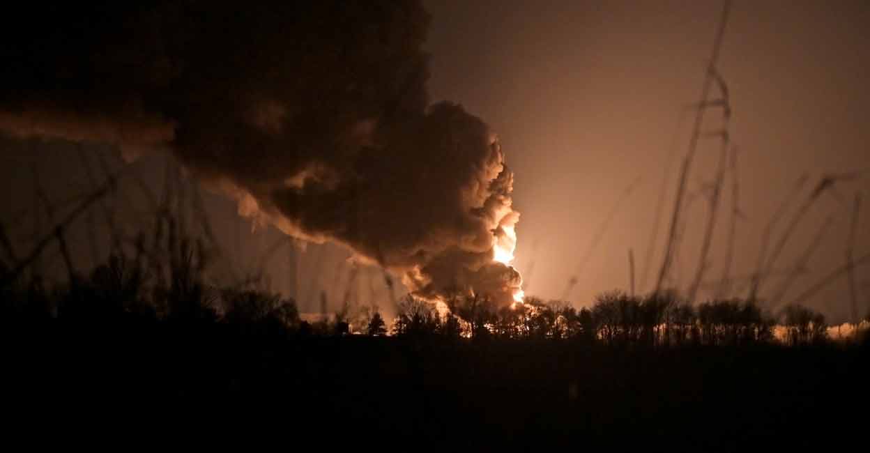 Russia-Ukraine A view shows a burning oil depot reportedly hit by shelling near the military airbase Vasylkiv in the Kyiv region, Ukraine February 27, 2022. REUTERS/Maksim Levin