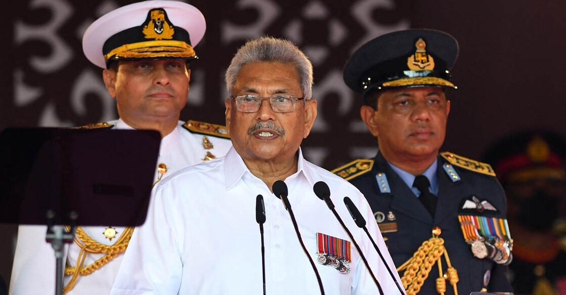 Sri Lanka's President Gotabaya Rajapaksa (C) addresses the nation along with Navy Chief Nishantha Ulugetenne (2L) and Airforce Chief Sudarshana Pathirana (R) during the Sri Lanka's 74th Independence Day celebrations in Colombo on February 4, 2022. (Photo: Ishara S. Kodikara/AFP