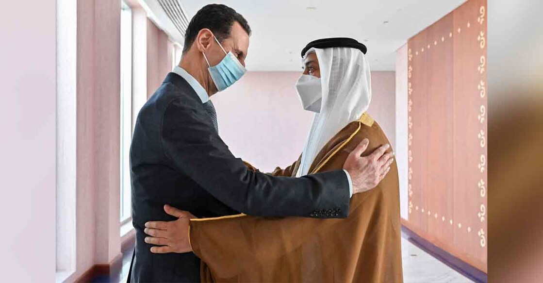 A handout picture released by the United Arab Emirates' Ministry of Presidential Affairs shows Syria's President Bashar al-Assad (left) being greeted by Sheikh Mansour bin Zayed Al Nahyan, UAE Deputy Prime Minister and Minister of Presidential Affairs , in the capital Abu Dhabi on Friday. Photo: AFP