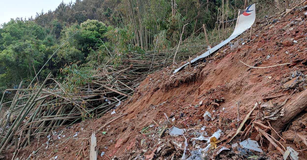 China Eastern Airlines Plane debris is seen at the site where a China Eastern Airlines Boeing 737-800 plane flying from Kunming to Guangzhou crashed, in Wuzhou, Guangxi Zhuang Autonomous Region, China March 21, 2022. Photo: Reuters/China Daily
