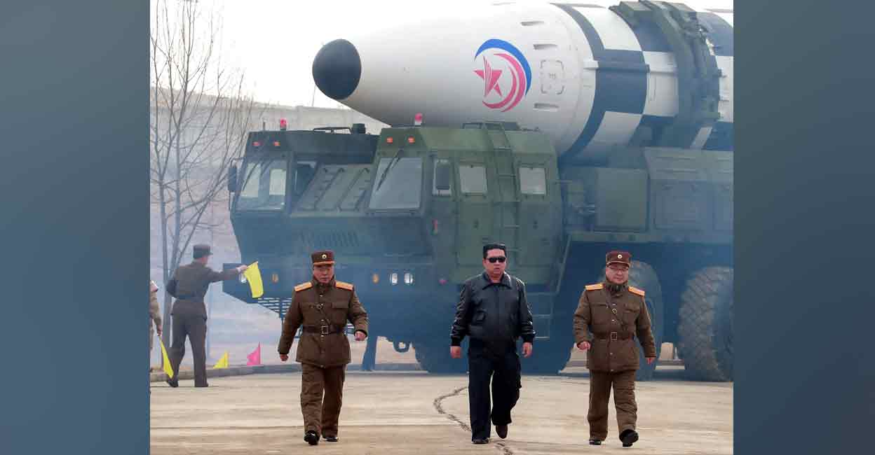 North Korean leader Kim Jong Un walks away from what state media report is a "new type" of intercontinental ballistic missile (ICBM) in this undated photo released on Thursday by North Korea's Korean Central News Agency (KCNA). Photo: Reuters 