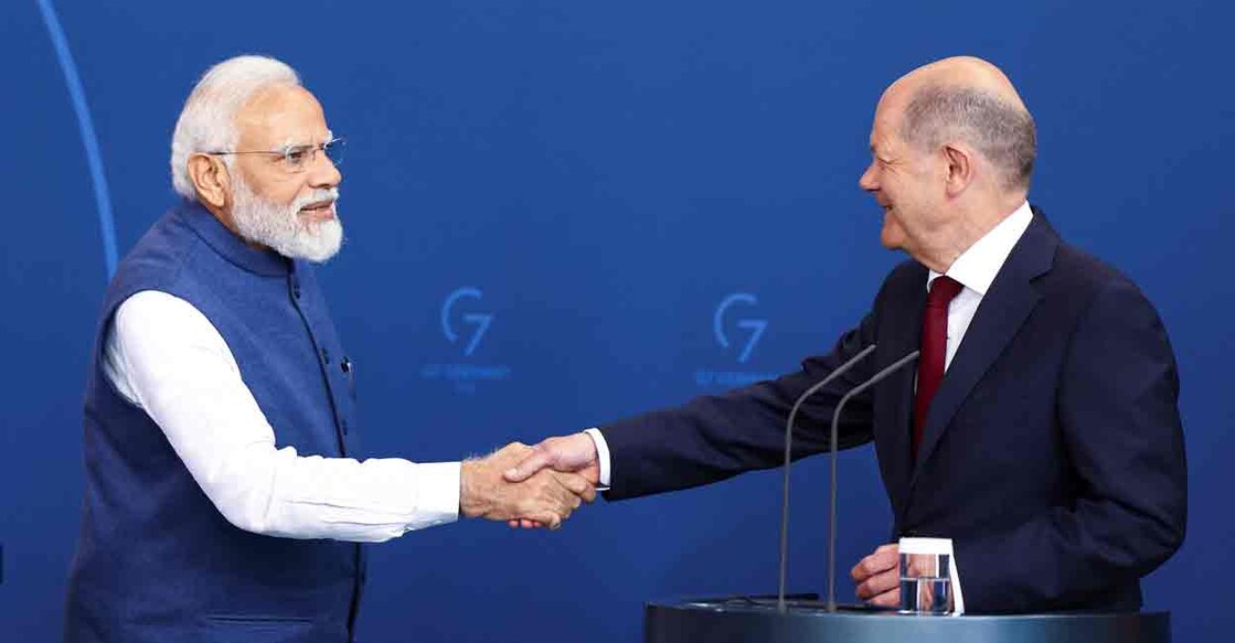 German Chancellor Olaf Scholz and Indian Prime Minister Narendra Modi shake hands as they attend a news conference during the German-Indian government consultations at the Chancellery in Berlin, Germany May 2, 2022. REUTERS/Lisi Niesner