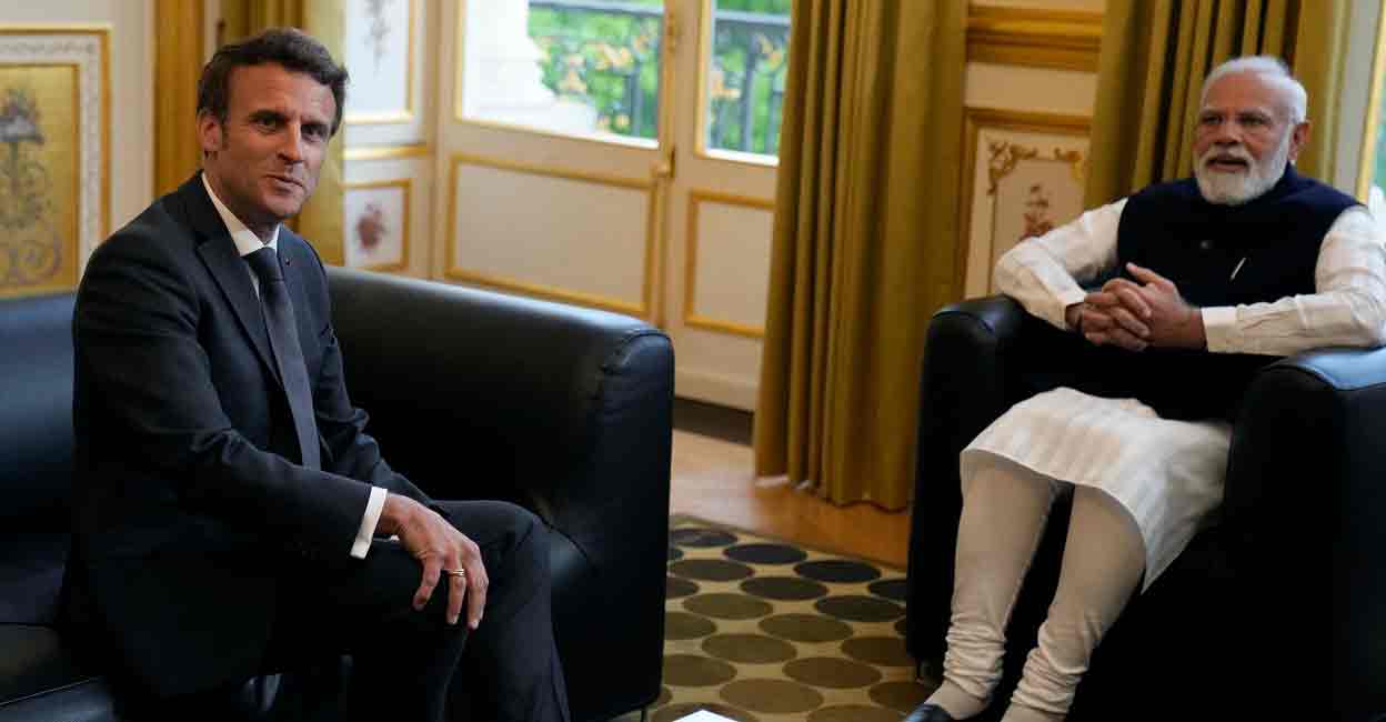 FRANCE-INDIA-DIPLOMACY France's President Emmanuel Macron with India's Prime Minister Narendra Modi in Paris, France May 4, 2022.