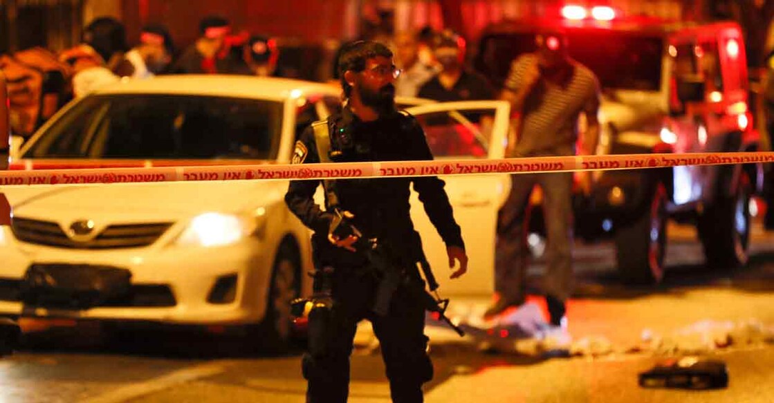 Israeli police and medics are pictured at the scene of an attack attack in the central Israeli city of Elad. Photo: AFP