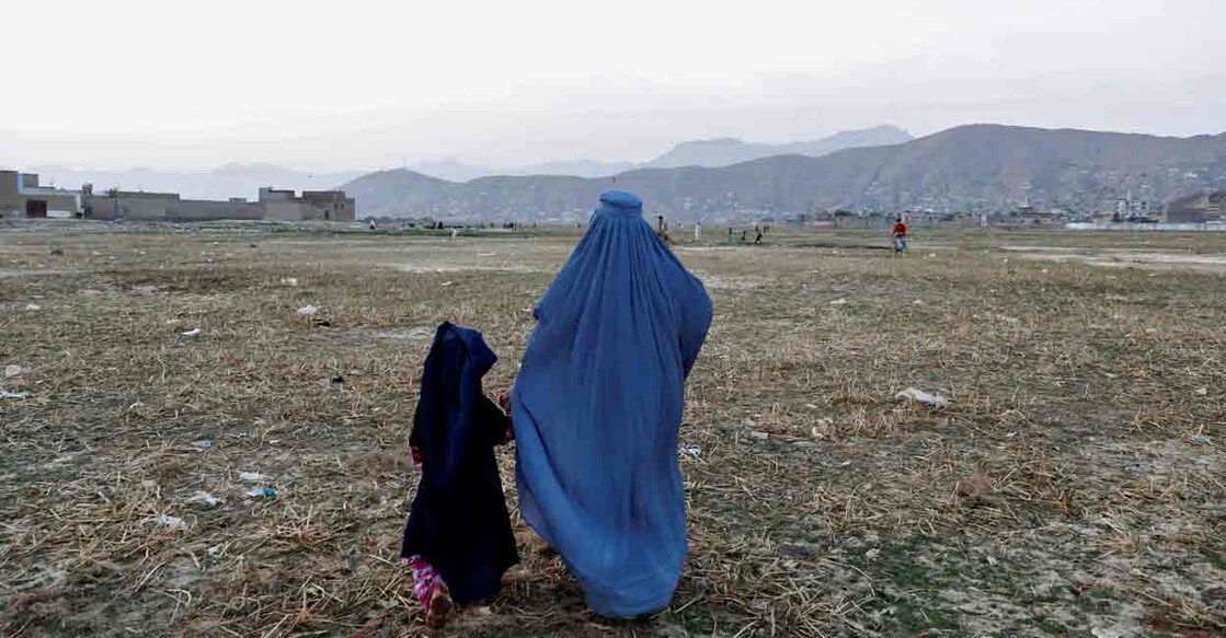 An Afghan woman clad in burqa walks in the early morning in Kabul, Afghanistan September 2, 2019.REUTERS/Mohammad Ismail