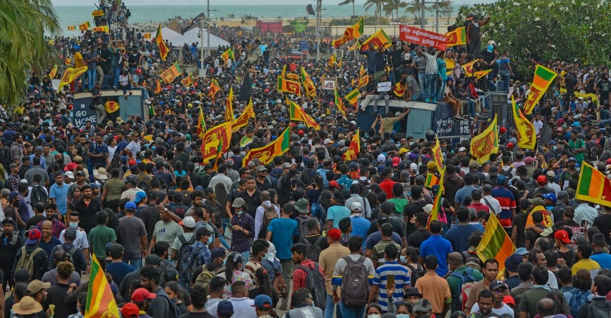 Protestors demanding the resignation of Sri Lanka's President Gotabaya Rajapaksa gather near the compound of Sri Lanka's Presidential Palace in Colombo on July 9, 2022. PHOTO: AFP