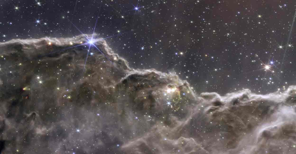 SPACE-EXPLORATION-TELESCOPE A composite image of the Cosmic Cliffs in the Carina Nebula, created with NIRCam and MIRI instrument data from NASA's James Webb Space Telescope. Photo: NASA, ESA, CSA, STScI, Webb ERO Production Team/Handout via REUTERS