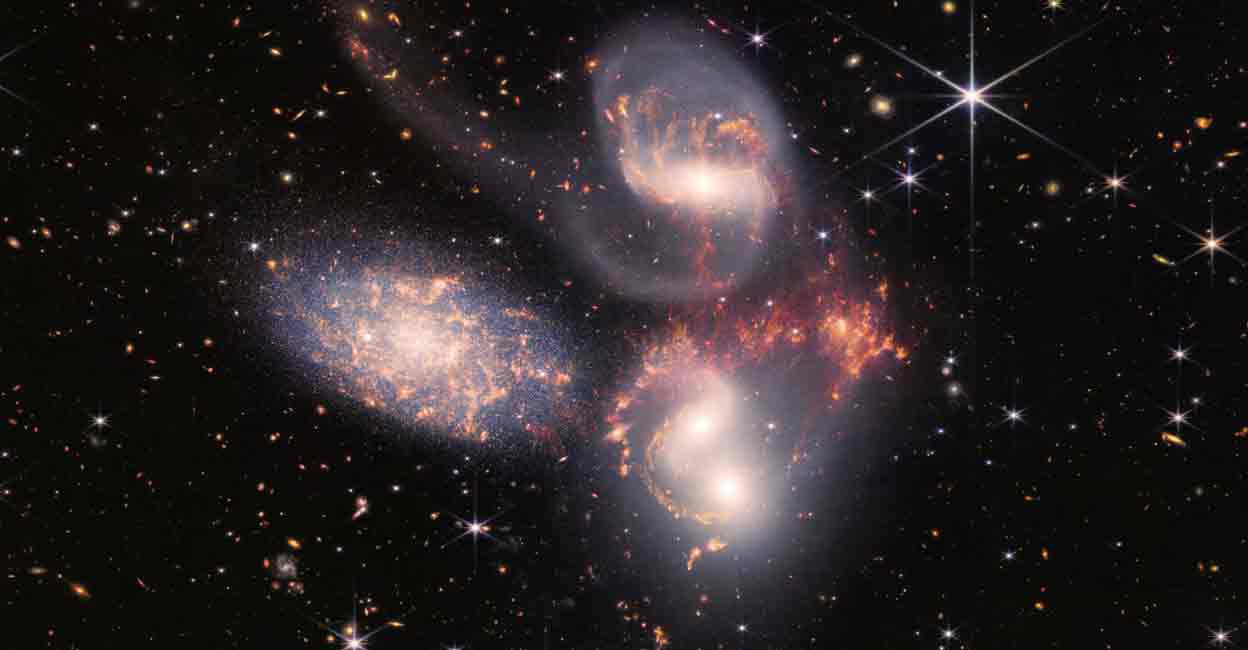 SPACE-EXPLORATION-TELESCOPE A group of five galaxies that appear close to each other in the sky: two in the middle, one toward the top, one to the upper left, and one toward the bottom are seen in a mosaic or composite of near and mid-infrared data from NASA's James Webb Space Telescope. Photo:. NASA, ESA, CSA, STScI, Webb ERO Production Team/Handout via REUTERS