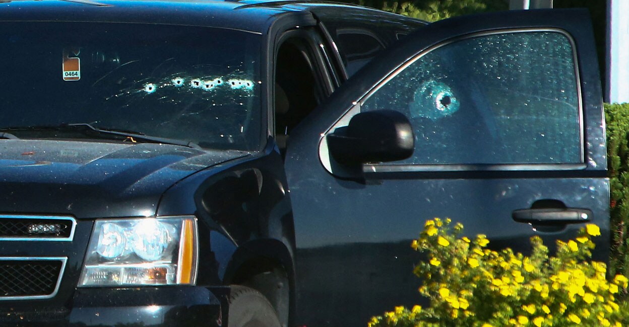 A vehicle with bullet holes visible on the windshield is seen after authorities alerted residents of multiple shootings targeting transient victims in the Vancouver suburb of Langley, British Columbia, Canada on Monday. Photo: Reuters/ Jesse Winter