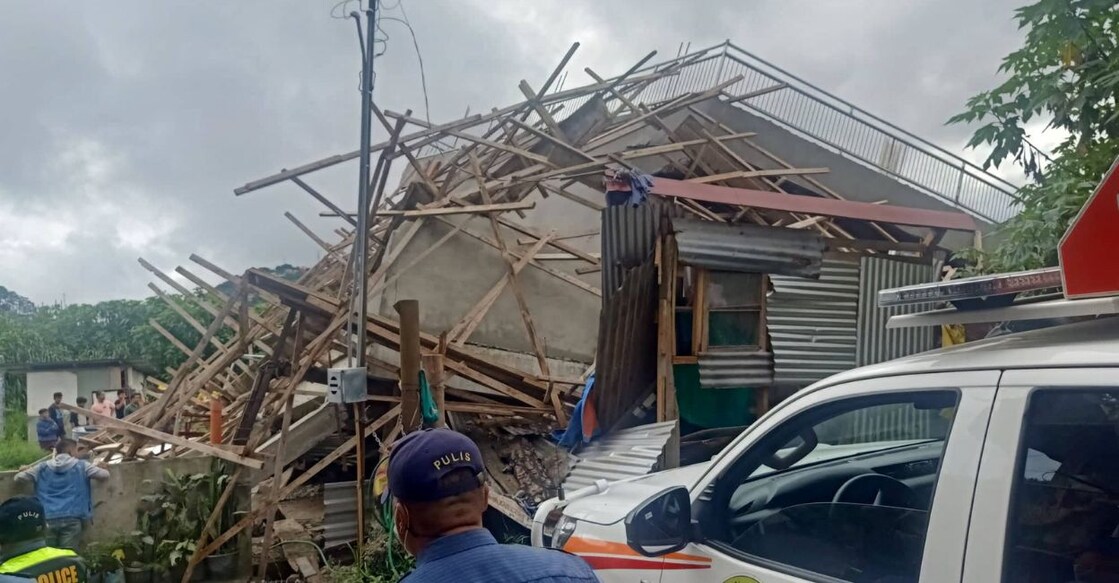 Emergency crew assess the damage outside a building that collapsed during the earthquake, in La Trinidad, Benguet, Philippines July 27, 2022. Public Information Service-Bureau of Fire Protection/Handout via Reuters