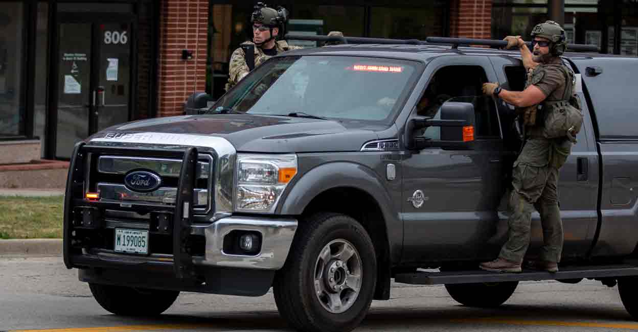 First responders work the scene of a shooting at a Fourth of July parade on July 4, 2022 in Highland Park, Illinois. Reports indicate at least five people were killed and 19 injured in the mass shooting. Photo:  Jim Vondruska/Getty Images/AFP 