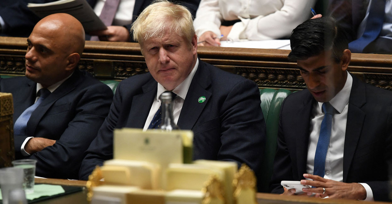 Sajid Javid (left), Britain's Prime Minister Boris Johnson and Rishi Sunak. File photo: AFP