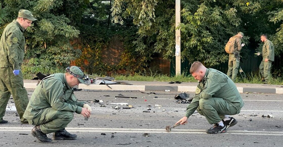 Investigators work at the site of a suspected car bomb attack that killed Darya Dugina, daughter of ultra-nationalist Russian ideologue Alexander Dugin, in the Moscow region, Russia August 21, 2022.Photo: Investigative Committee of Russia/Handout via REUTERS