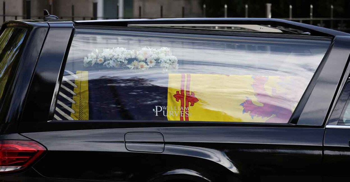 The hearse carrying the coffin of Britain's Queen Elizabeth departs Balmoral Castle, in Balmoral, Scotland, Britain September 11, 2022. REUTERS/Phil Noble