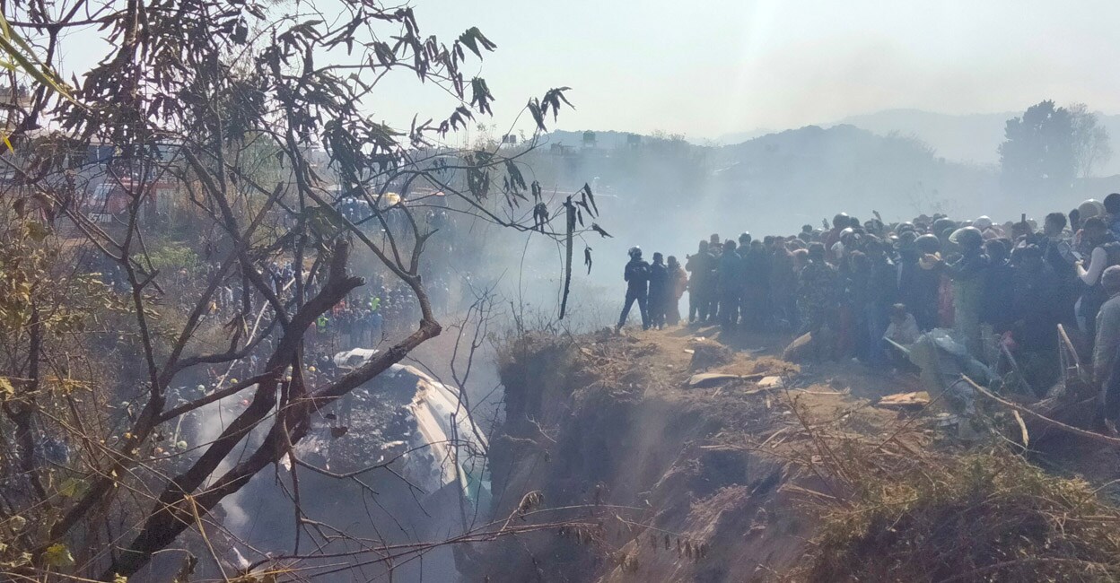 nepal-air-add-1 Photo from the crash site of an aircraft carrying 72 people in Pokhara in western Nepal. Photo: Reuters/ Sagar Raj Timilsina