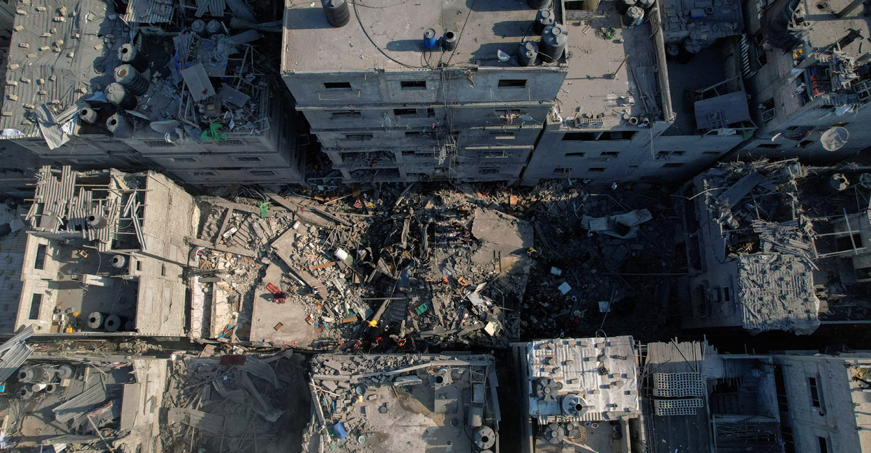 ISRAEL-PALESTINIANS A view shows the ruins of a Palestinian house hit by Israeli strikes at al-Shati (Beach) refugee camp, in Gaza City, October 12, 2023. Photo: Reuters/Mohammed Fayq Abu Mostafa