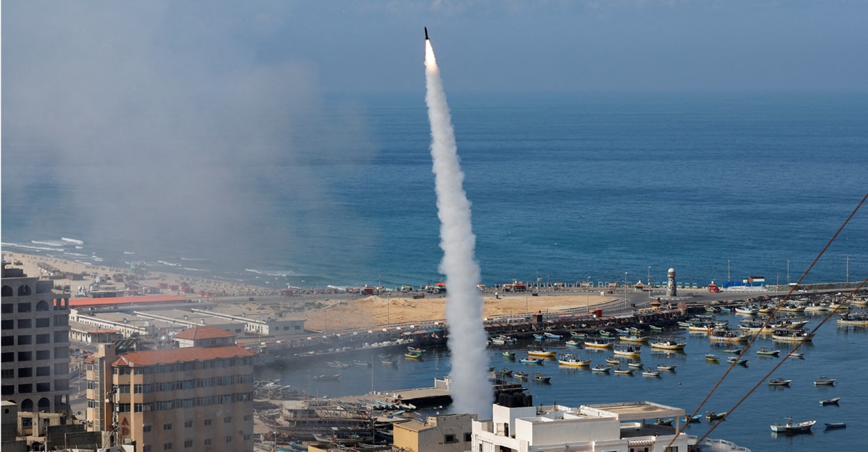 hamas-attack-add-6 Rockets fired by Palestinian militants into Israel, in Gaza City on Saturday. Photo: REUTERS/Mohammed Salem