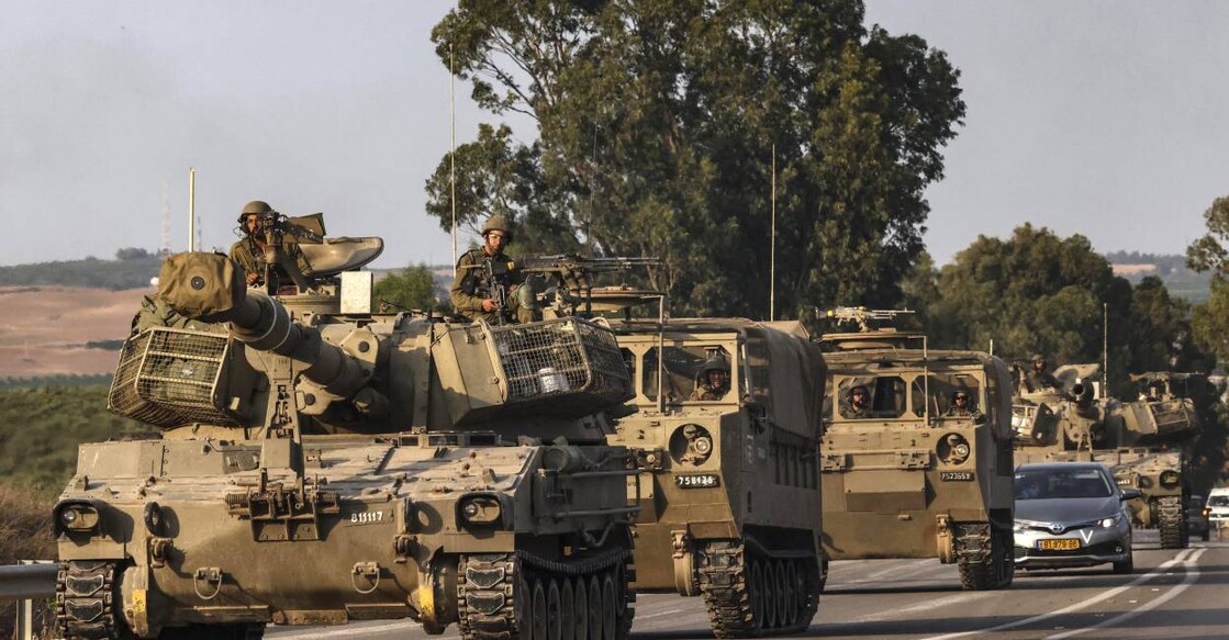 An Israeli self-propelled howitzer rolls on a highway near the southern city of Sderot. Photo: AFP
