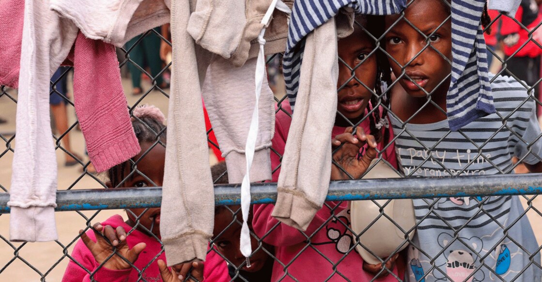 Displaced Palestinian children gather for breakfast at a refugee camp in Rafah in the southern Gaza Strip, on November 12, 2023, as battles between Israel and the Palestinian Hamas movement continue. Photo: AFP/ Mohammed Abed