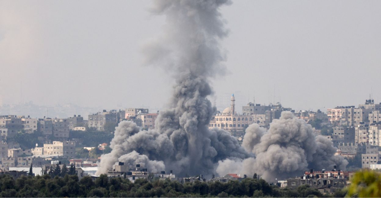 israel-hamas-battle-1 Smoke rises above Gaza, amid the ongoing conflict between Israel and the Palestinian group Hamas, as seen from southern Israel, November 13, 2023. Photo: Reuters/Ronen Zvulun