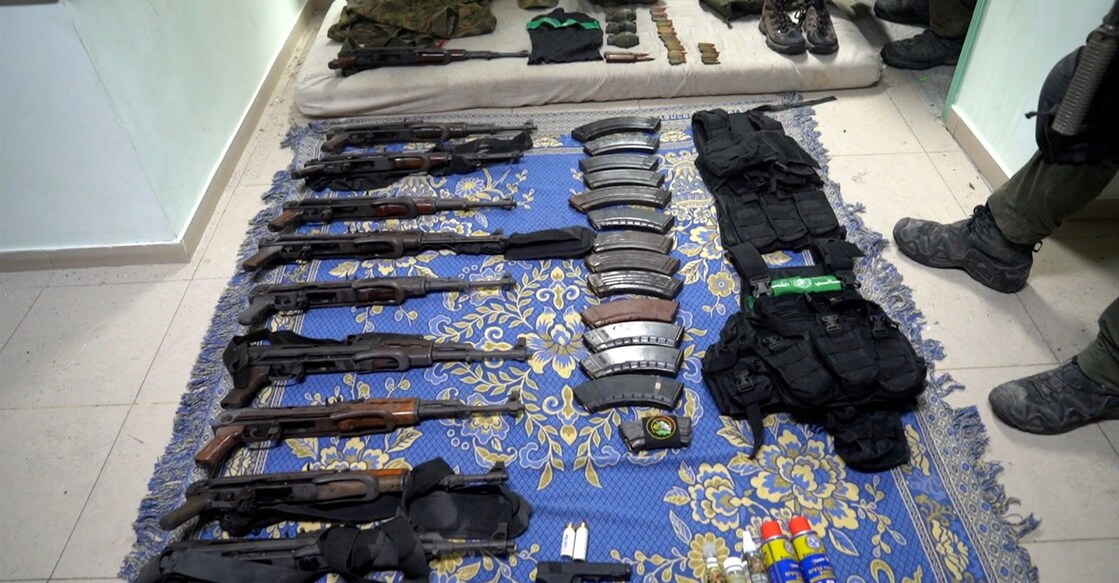 Weapons and equipment which Israel's army says it found at Al Shifa hospital complex in the Gaza Strip, as seen in a handout picture released by the Israel Defense Forces. Photo: Israel Defense Forces/Handout via REUTERS
