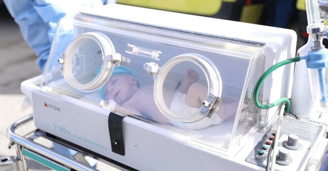 A premature Palestinian baby, evacuated from Gaza, lies inside an incubator on the Egyptian side of the Rafah border on November 20, 2023. Photo: Courtesy Egyptian Health Ministry/Handout via Reuters