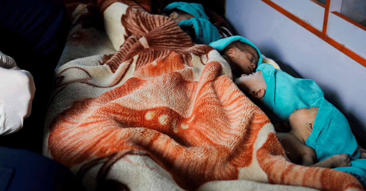 ISRAEL-PALESTINIANS-PREMATURE-BABIES Premature babies, who were evacuated from Al Shifa hospital, lie in an ambulance before they are transported for treatment in UAE, at Rafah border crossing with Egypt, in Rafah, in the southern Gaza Strip, November 20, 2023. Photo: Reuters/Hatem Khaled