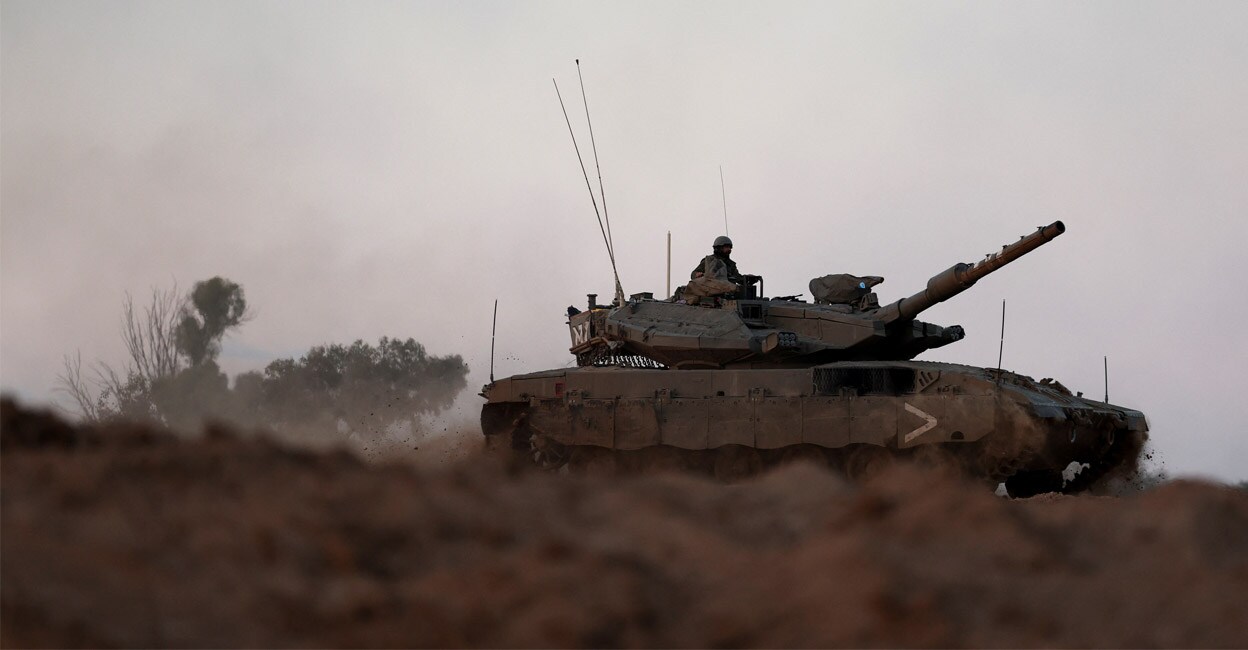 gaza-israeli-hostages-add2 A tank manoeuvres near the border with Gaza, amid the ongoing conflict between Israel and the Palestinian Islamist group Hamas, in southern Israel. Photo: REUTERS/Ronen Zvulun