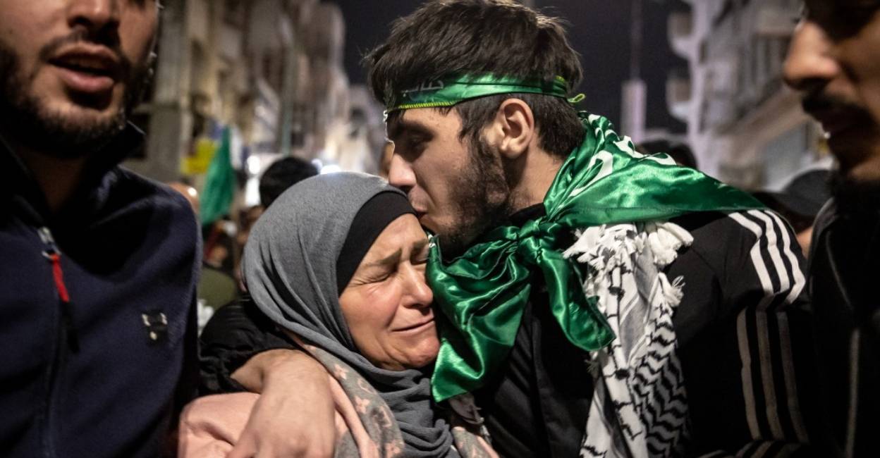 A Palestinian prisoner hugs his mother after being released from an Israeli jail in exchange for Israeli hostages released by Hamas from the Gaza Strip. Photo: AFP