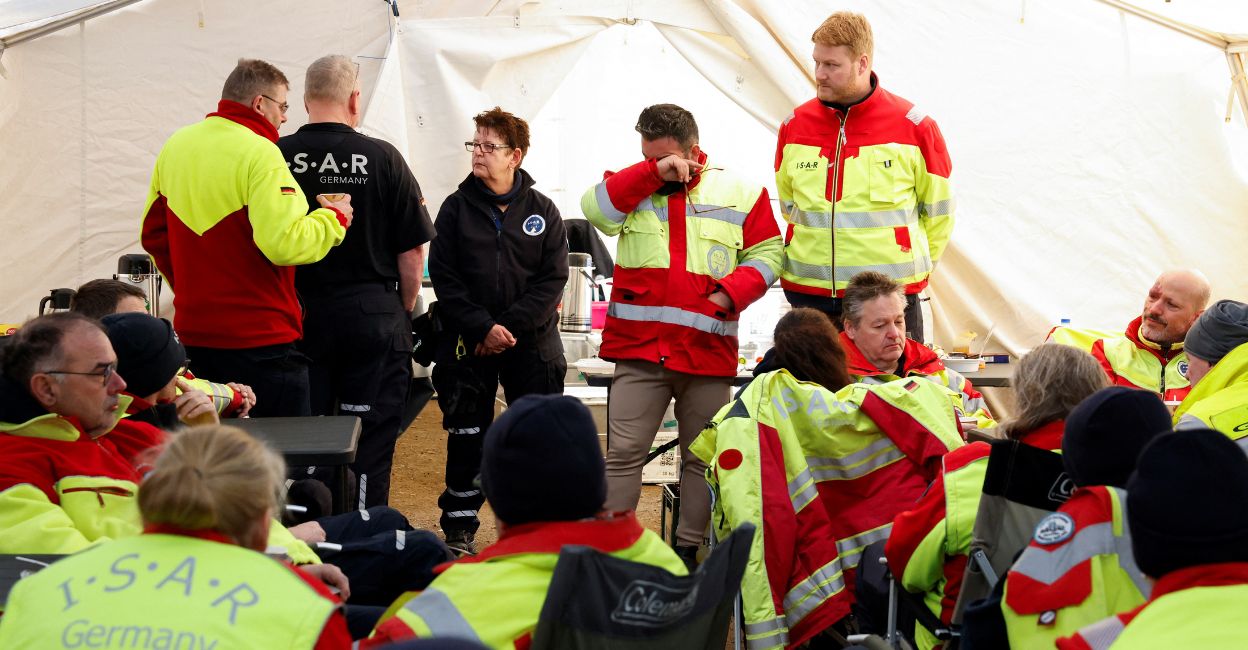 turkey-quake-new-2 Members of the ISAR Germany (International Search and Rescue) react after learning that Zeynep, the woman they rescued the day before, has died, as the search for survivors continues, in the aftermath of a deadly earthquake in Kirikhan, Turkey February 11, 2023. Photo: Reuters