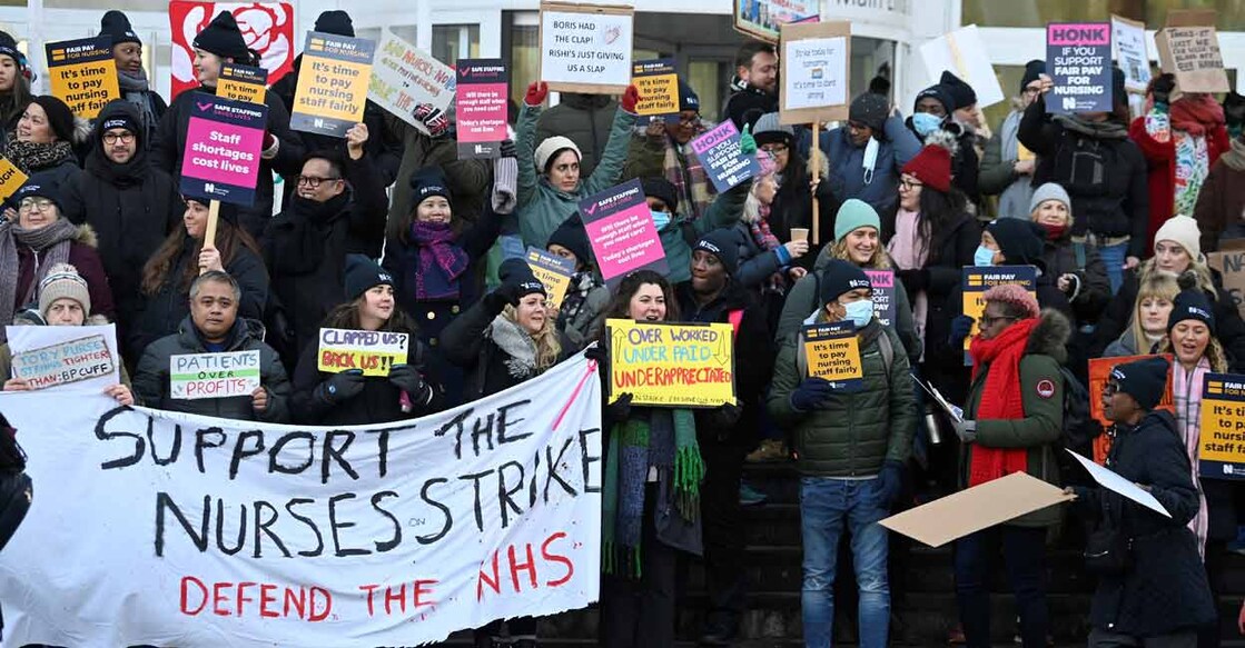 NHS nurses hold banners during a strike, amid a dispute with the government over pay, in London on January 18, 2023. File photo: ReutersToby Melville