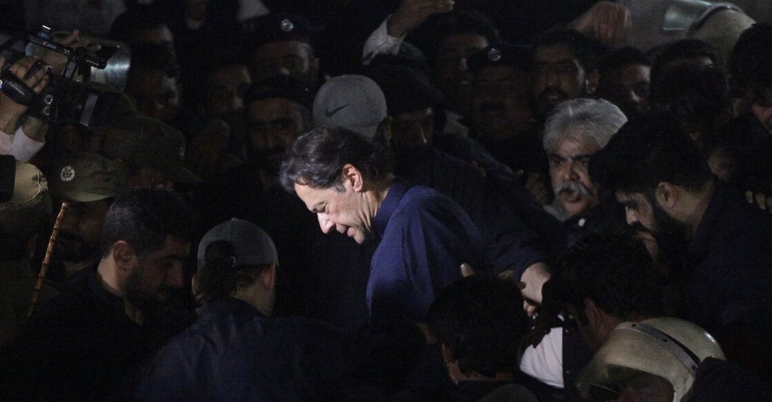 Pakistan's former Prime Minister, Imran Khan, along with his supporters walks as he leaves the district High Court in Lahore, Pakistan February 20, 2023. Photo: Reuters