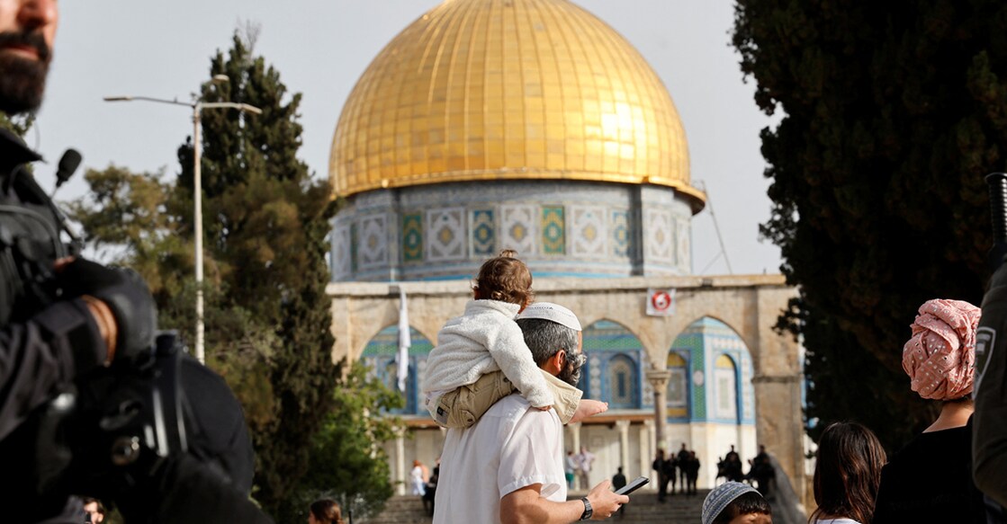 Jewish visitors are seen at the compound that houses Al-Aqsa Mosque, known to Muslims as Noble Sanctuary and to Jews as Temple Mount, while tension arises during clashes in Jerusalem's Old City. Photo: Reuters/Ammar Awad